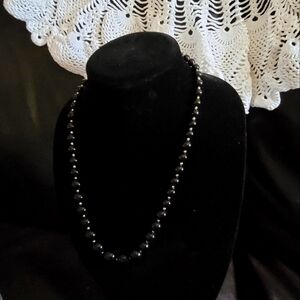 Black and gold tone beads necklace